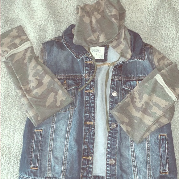 camo jacket with blue jeans